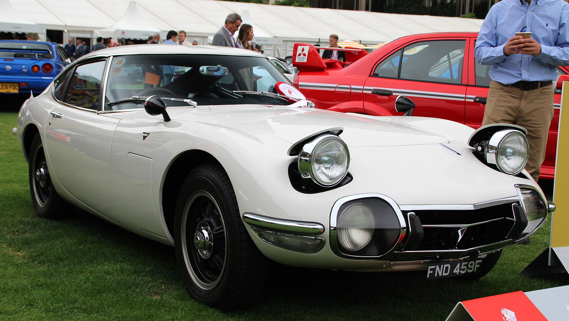 Front three-quarter view of a white 1968 Toyota 2000GT