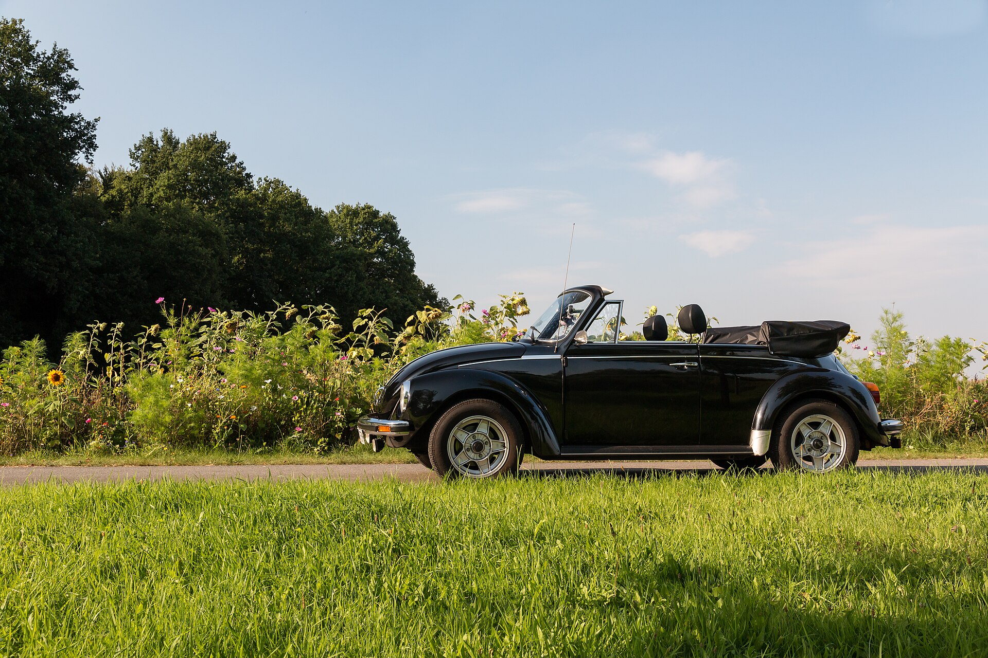 Side profile of a black Volkswagen 1303 Cabriolet